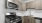 a kitchen with wooden cabinets