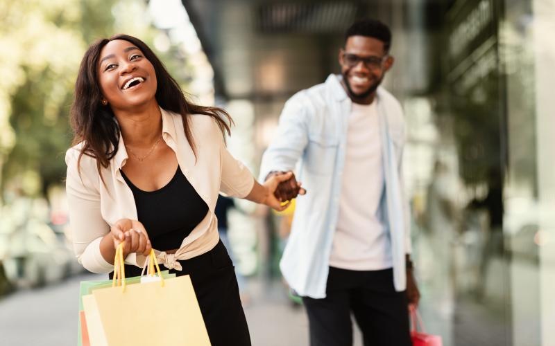The essence of exceptional living a woman carrying a shopping bag