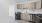 a kitchen with wooden cabinets