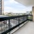 a balcony overlooking a city