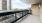 a balcony overlooking a city