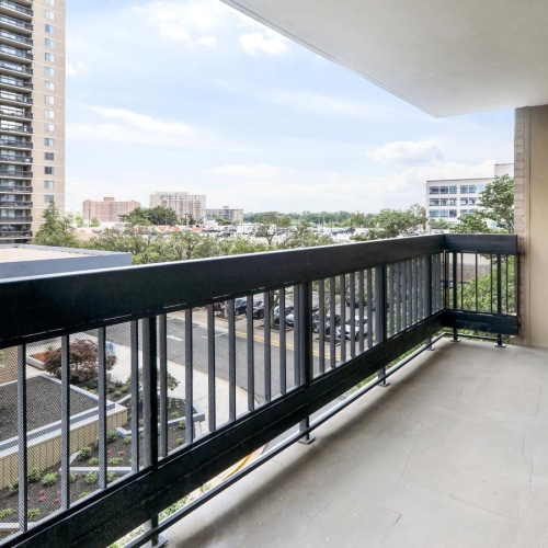 a balcony overlooking a city