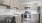 a kitchen with wooden cabinets
